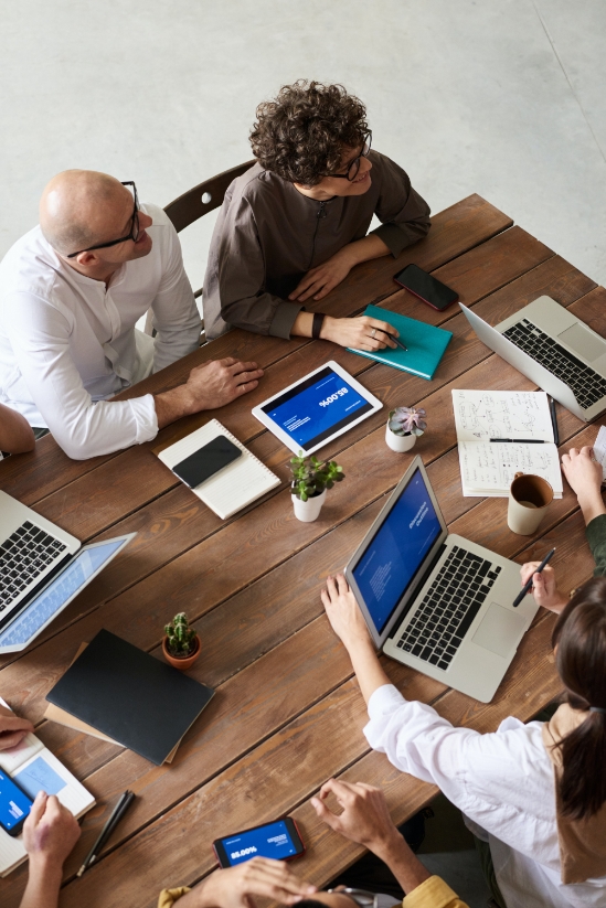 image of office workers collaborating at their desk